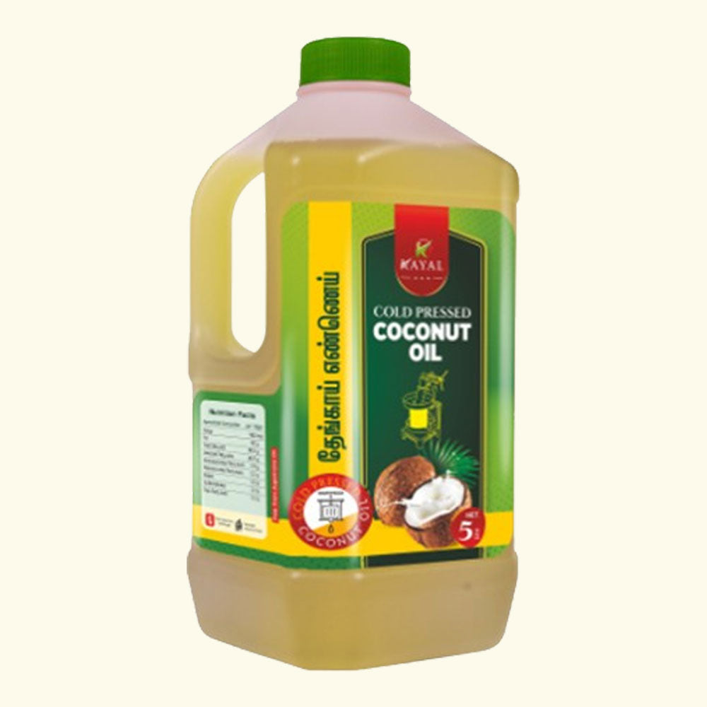 edible coconut oil  5 litre bottle being used for deep frying and cooking