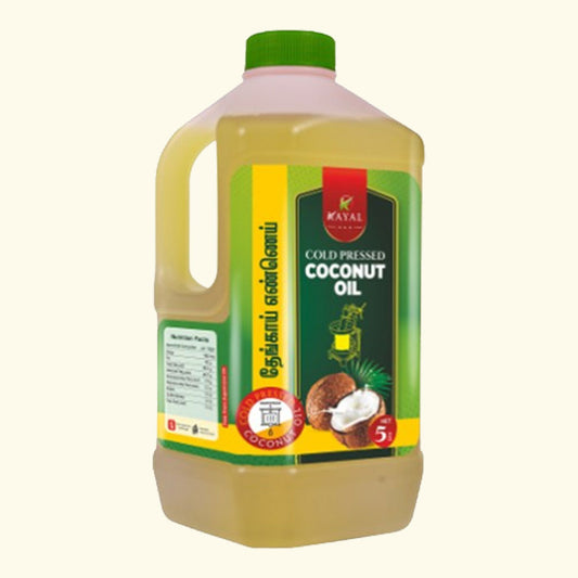edible coconut oil  5 litre bottle being used for deep frying and cooking